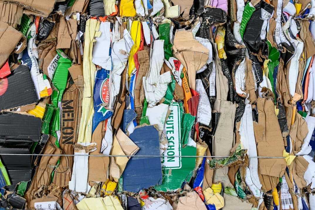 Waste sorting and recycling facility with sorted materials